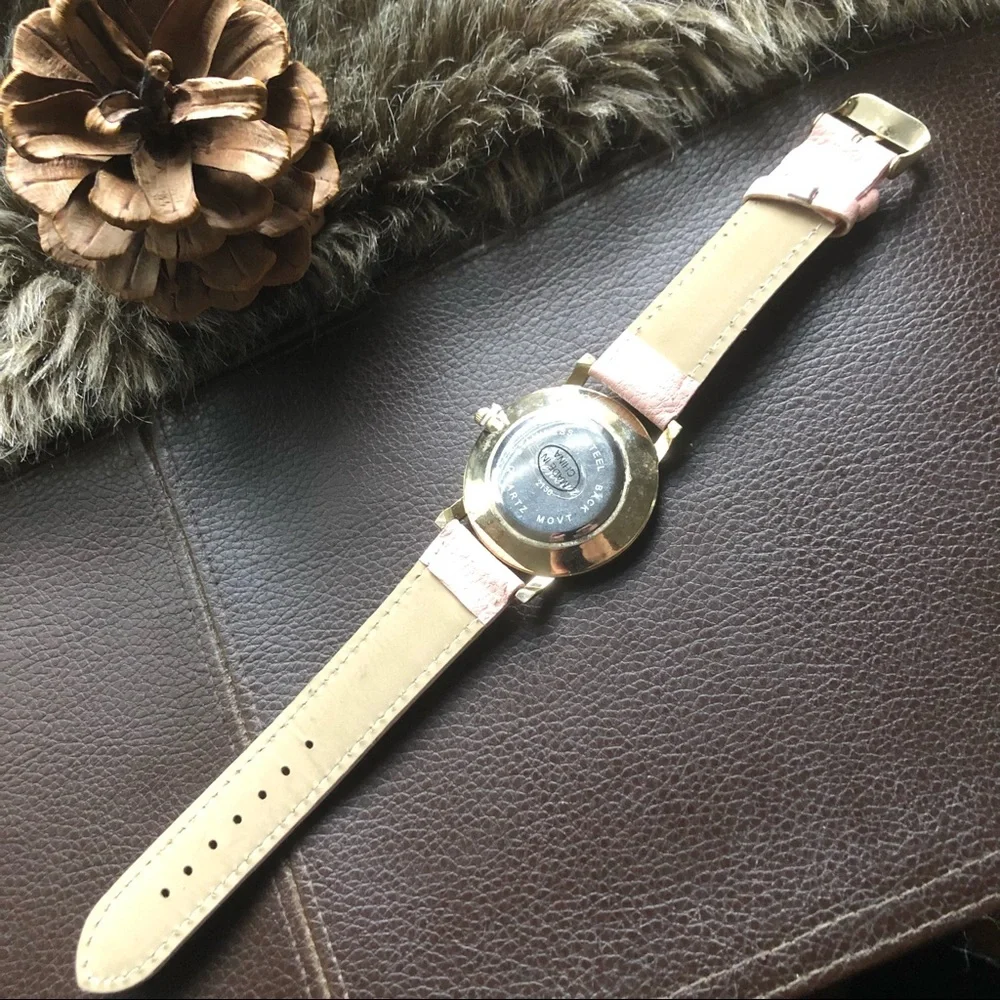 Ladies Geneva blush pink faux leather band watch